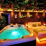 Relax Spa-4 Pers-jacuzzi-parking-jardin-clim-colmar *
